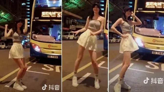 香港一短裙長腿少女，衝出馬路拍抖音呃like！阻住巴士遭網友圍插…