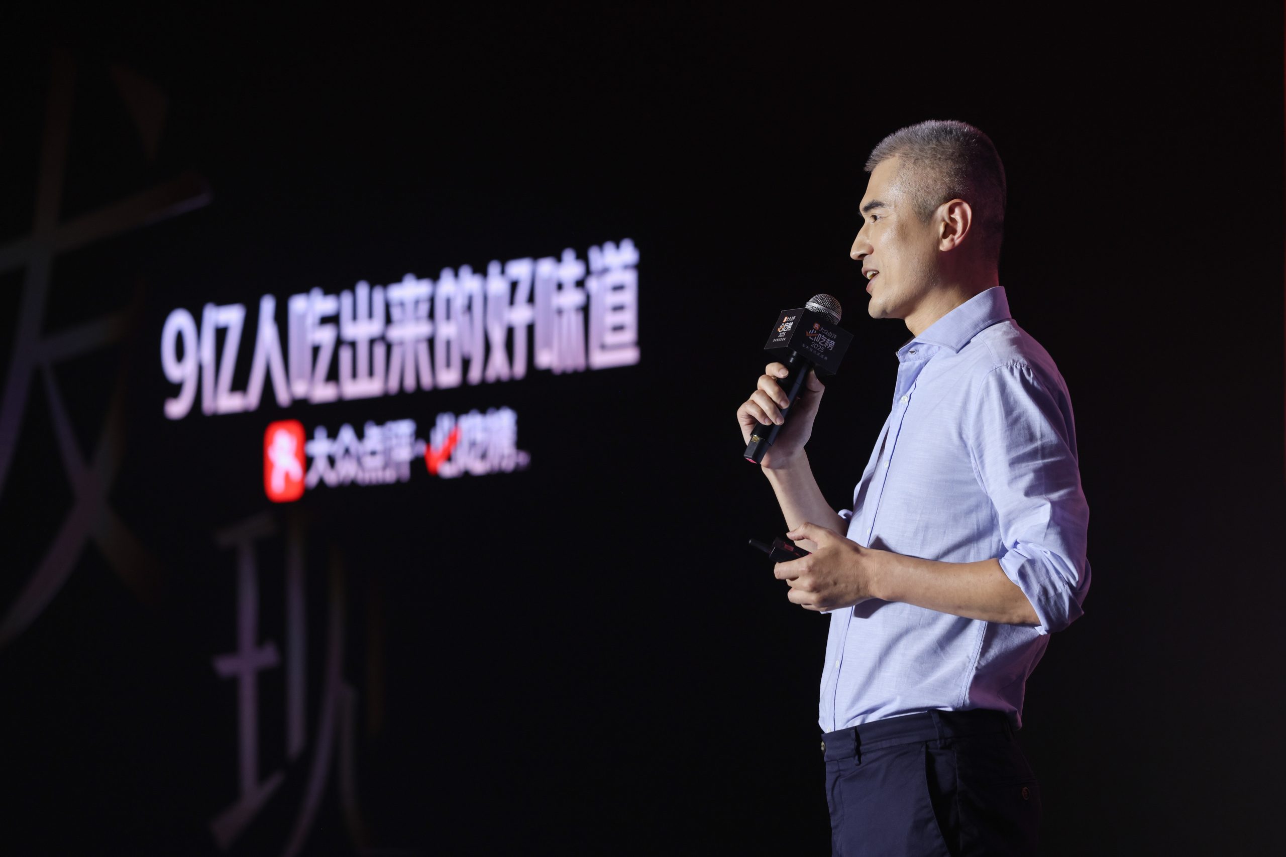 A person speaking into a microphoneAI-generated content may be incorrect.
