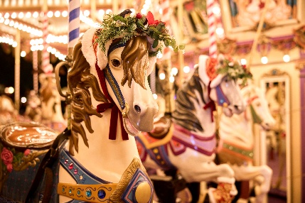 A group of horses on a carousel

AI-generated content may be incorrect.